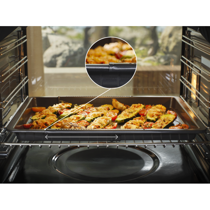 Extendable Easy2Clean Oven Tray adjusts to your cooking needs.