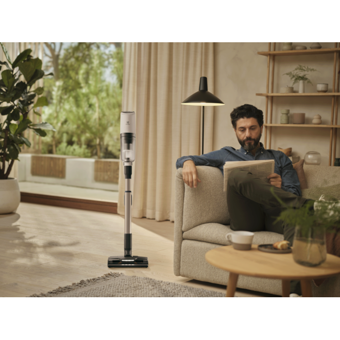 Vacuum cleaner in use in a home environment