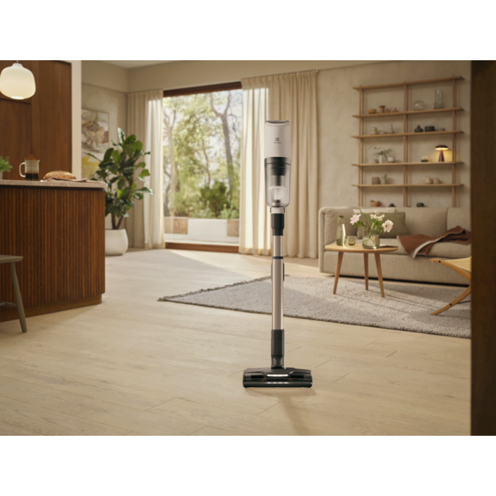 Vacuum cleaner in use in a home environment