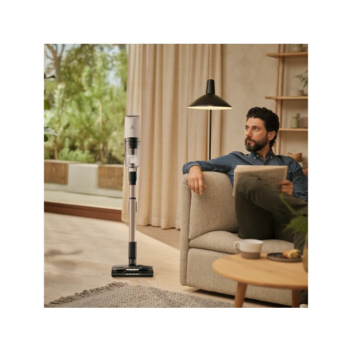 Vacuum cleaner in use in a home environment