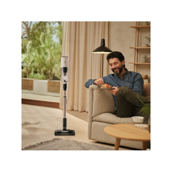 Vacuum cleaner in use in a home environment