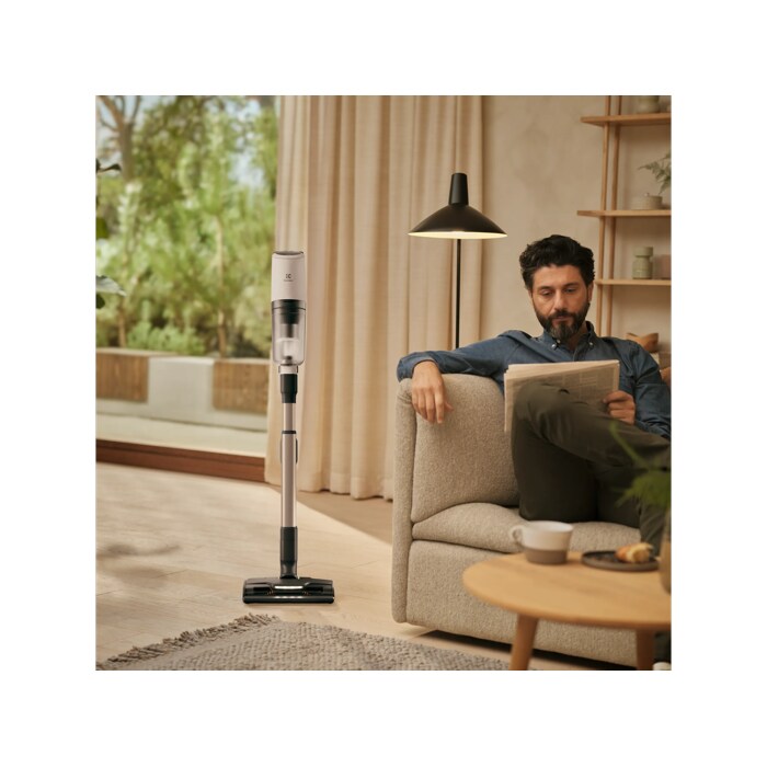 Vacuum cleaner in use in a home environment