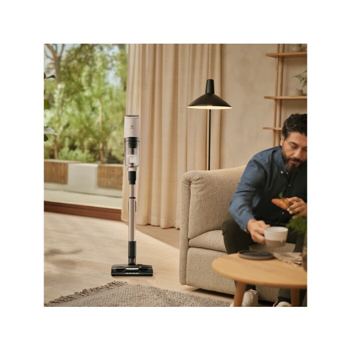 Vacuum cleaner in use in a home environment
